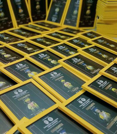 Bulk school graduation photo frames for annual day distribution.